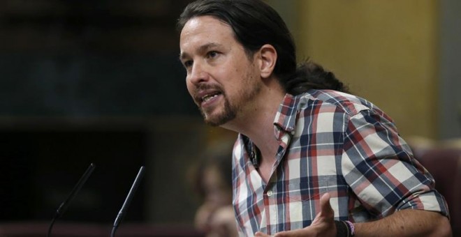 El lider de Podemos, Pablo Iglesias, durante su intervención en la sesión del debate de su investidura. - EFE