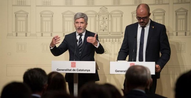 El ministro del Interior, Fernando Grande-Marlaska, y el conseller de Interior de la Generalitat, Miquel Buch. /EFE