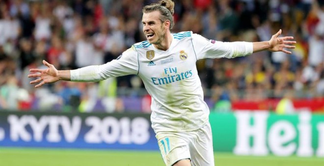 Gareth Bale celebra uno de sus dos goles en la final de Champions contra el Liverpool.- EFE