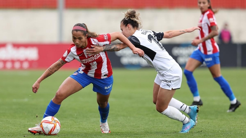 Deyna Castellanos of Atletico de Madrid and Esther Martin of Valencia in action during the spanish women league, Primera Iberdrola, football match played between Atletico de Madrid and Valencia CF at Centro Deportivo Wanda on march 26, 2022, in Alcala de