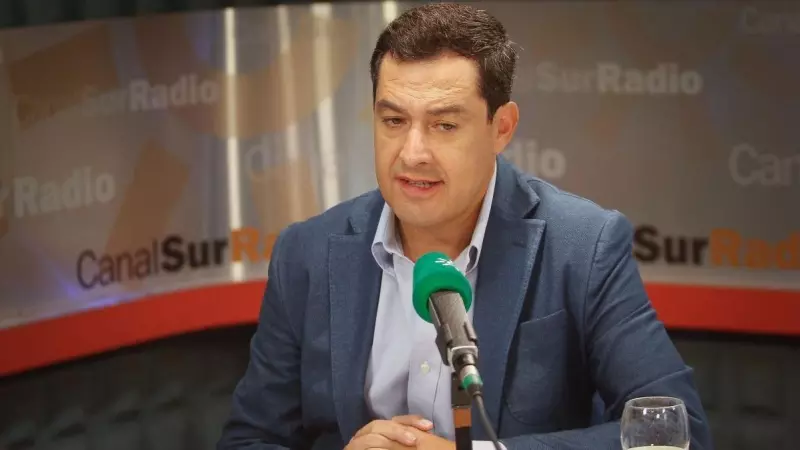 Imagen de archivo del presidente de la Junta de Andalucía, Juanma Moreno, durante una entrevista en la sede de Canal Sur Radio, en el Pabellón de Andalucía de la Isla de la Cartuja.