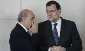 El expresidente del Gobierno Mariano Rajoy y el exministro del Interior Jorge Fernández Díaz en una imagen de archivo. EFE