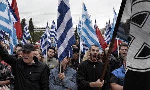 Seguidores del partido griego de ideología neonazi Amanecer Dorado, durante una manifestación en Atenas. AFP