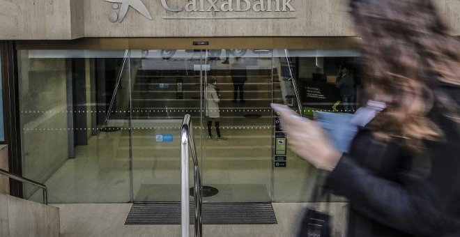 CaixaBank gana 1.278 millones hasta junio sin los extraordinarios de la fusión con Bankia