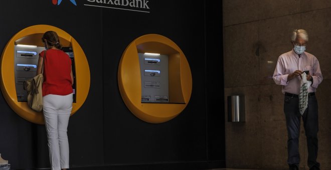 CaixaBank gana 1.381 millones, un 19% menos tras dotar 1.252 millones por la covid-19