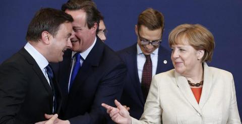 Bettel, Cameron y Merkel, en la cumbre extraordinaria sobre inmigración. / EFE