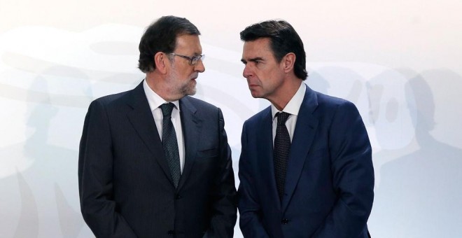 José Manuel Soria junto a Mariano Rajoy durante el acto en Ifema esta semana. EFE