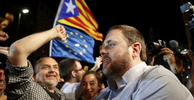 Oriol Junqueras celebrando los resultados vanzados por el sondeo de TV3./ REUTERS