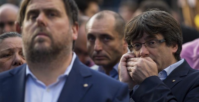 Junqueras y Puigdemont, en la manifestación de Barcelona del sábado. EFE/Enric Fontcuberta