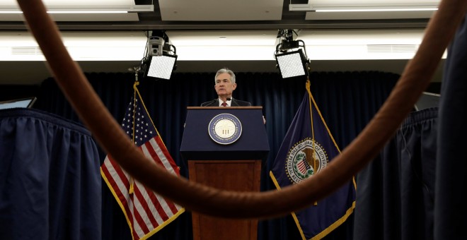 El presidente de la Reserva Federal, Jerome Powell en la rueda de prensa posterior a la reunión del banco central estadounidense en la que se ha acordado la cuarta subida de tipos en 2018. REUTERS/Yuri Gripas