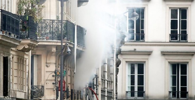 A smoke rises from a building at the scene of an explosion at a bakery near Rue de Trevise in Paris, France, 12 January 2019. According to police, a suspected gas leak has lead to an explosion of a bakery in Paris, injuring several people and damaging sur