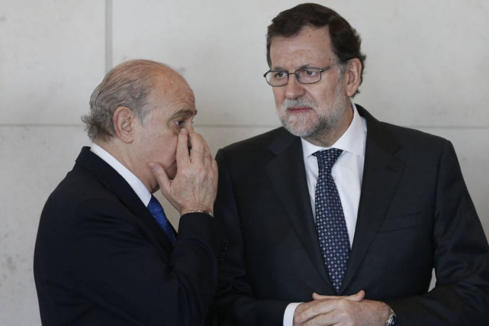 El expresidente del Gobierno Mariano Rajoy y el exministro del Interior Jorge Fernández Díaz en una imagen de archivo. EFE