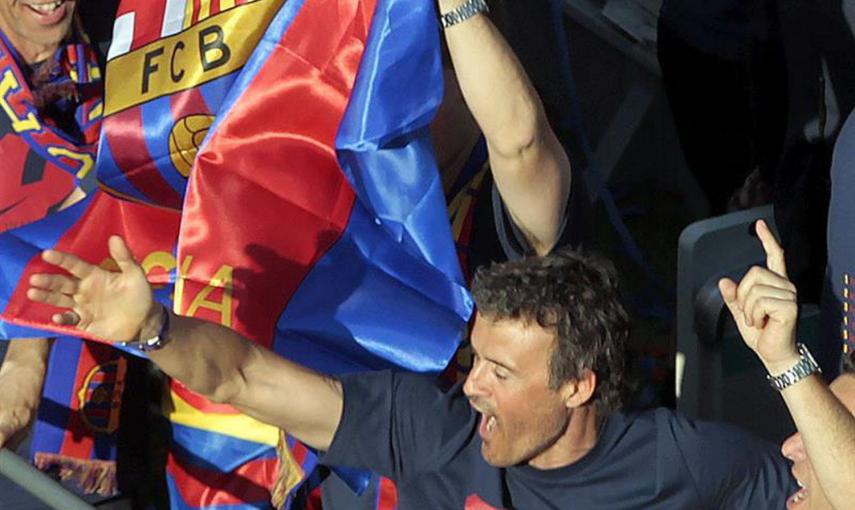 Luis Enrique celebra eufórico el triplete conseguido en su primera temporada como técnico del Barça.- EFE