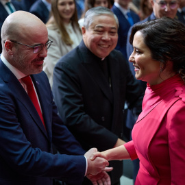 La presidenta de la Comunidad de Madrid, Isabel Díaz Ayuso saluda al delegado del Gobierno en la Comunidad de Madrid, Francisco Martín, a su llegada a los actos conmemorativos del 45º aniversario de la Constitución Española, en la Real Casa