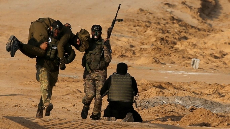 29/12/2021 Militantes palestinos participan en un ejercicio militar en Rafah, en el sur de la Franja de Gaza