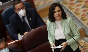 La presidenta de la Comunidad de Madrid, Isabel Díaz Ayuso, interviene en el pleno en la Asamblea de Madrid, este jueves.