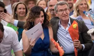 Isabel Díaz y Ayuso y Alberto Núñez Feijóo, durante un acto de campaña del PP en Madrid.