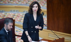 La presidenta de la Comunidad de Madrid, Isabel Díaz Ayuso, durante una sesión plenaria en la Asamblea de Madrid, a 3 de octubre de 2024, en Madrid.