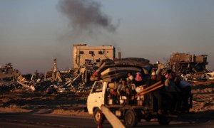 Familias saliendo de Rafah, Palestina