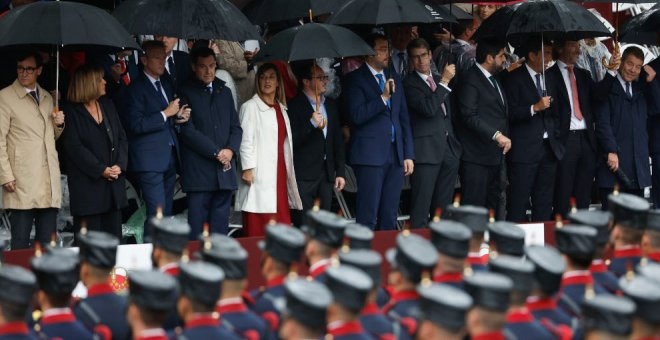 Buruaga asiste al desfile militar por el Día de la Fiesta Nacional de España